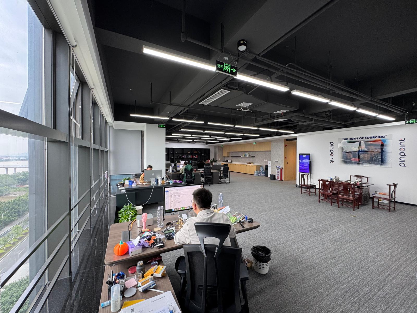 Pinpoint's China sourcing team working in the open-plan office
